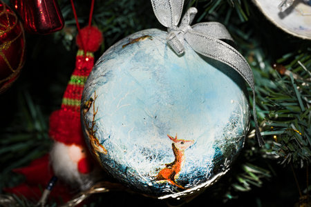 Christmas decoration on the Christmas tree. New Year's toys and gifts.の写真素材