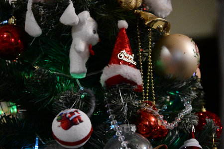 Christmas decorations on the Christmas tree. New Year's toys on the Christmas tree.