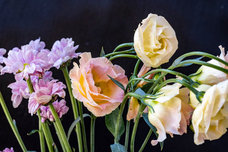 beautiful bouquet of flowers on the black backgroundの写真素材
