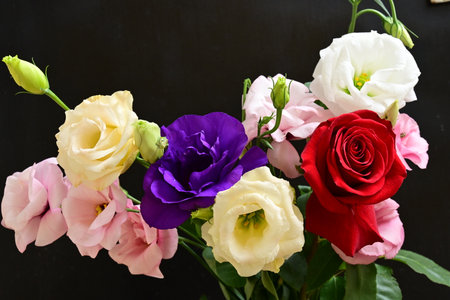 Beautiful bouquet of flowers on a black backgroundの写真素材