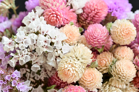 Beautiful bouquet of dried flowers, closeup. Floral background