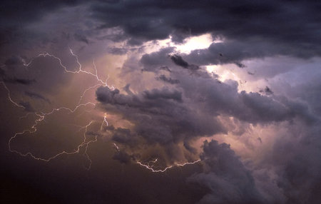 Lightning strike in the dark sky, thunderstorm and storm cloudsの写真素材