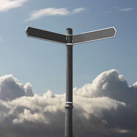 A Blank Signpost with Cloudsの写真素材