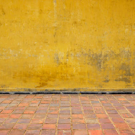 An Old Wall Background with Floor Tiles
