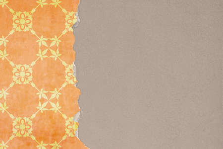 A Stone Wall Background with Broken Plaster and Wallpaper Pattern