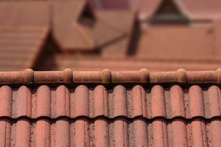 A Roof Top with Red Tiles