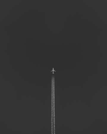 minimal black and white airplane fling aboveの写真素材