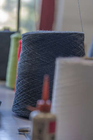 close up of a yarn of wool roll used for weaving sweater in an handloom industry