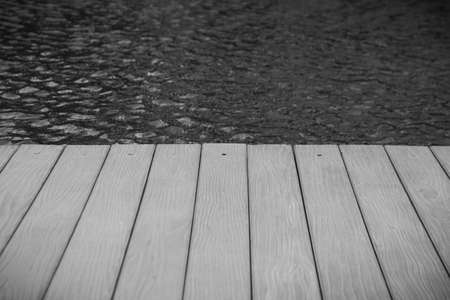 Black &â€‹ Whiteâ€‹ image of Aâ€‹tificial wood balcony, The gray-colored modeled...