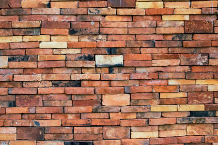 Old red brick wall. contemporary and vintageâ background.の写真素材