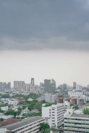 25 April 2020, sky conditions and buildings before heavy rain, gray sky overcast. The atmosphere before the rain in Bangkok, Thailand.の写真素材