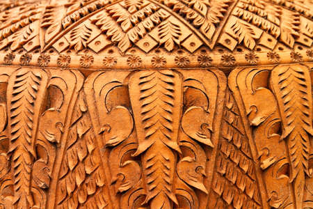 Pottery is beautifully carved and textured. The outer surface of red pottery.の写真素材