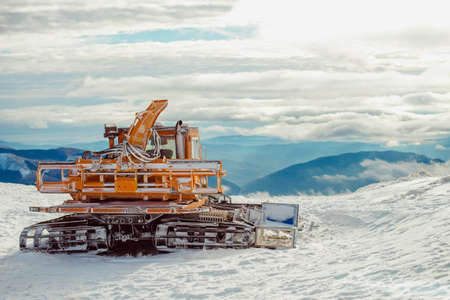 Snow tractor on the slope of mountain Bugegiの写真素材