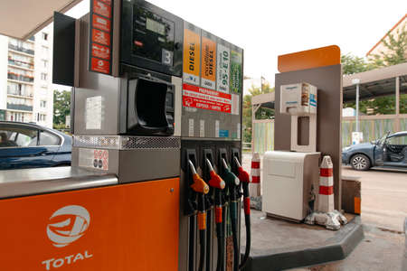 Paris, France-June,10 2021: Fuel Pumps at the Petrol Station, red and yellow colorful fuelのeditorial素材