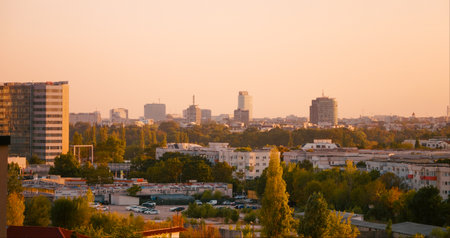 Urban city housing in downtown during late hours. Sunset in the city skyline. Colorful sunset.の写真素材