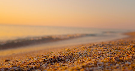 Bright golden waves close up at risen. Beautiful landscape, enjoying holiday, Sea, vacation seaside.の写真素材