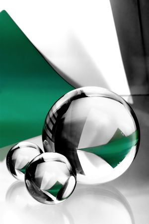 three glass balls on background of paperの写真素材