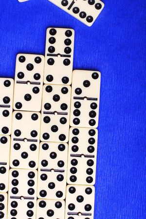 few domino on blue background