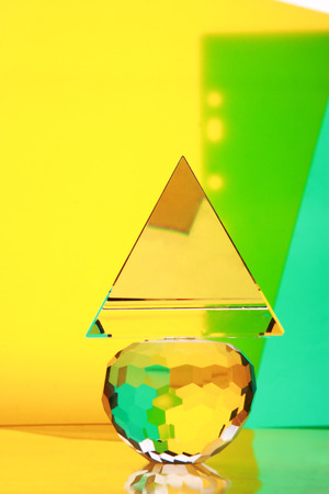 glass pyramid on crystal ballの写真素材