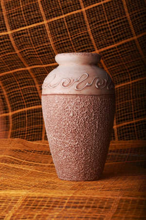 ancient rods basken on orange backgroundの写真素材