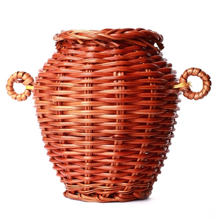 wicker basket on isolated backgroundの写真素材