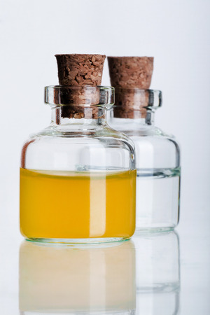 Many glass medicine bottles with color waterの写真素材