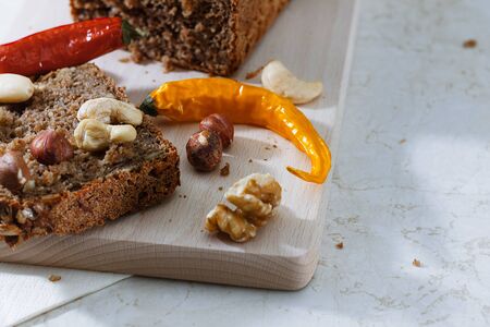 cut bread on a white boardの写真素材