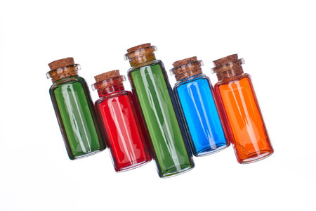 Many filled glass bottles on isolated backgroundの写真素材