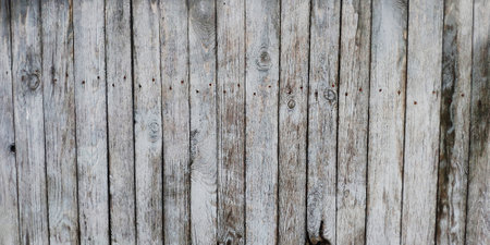 part of an old rustic grey wooden fenceの写真素材