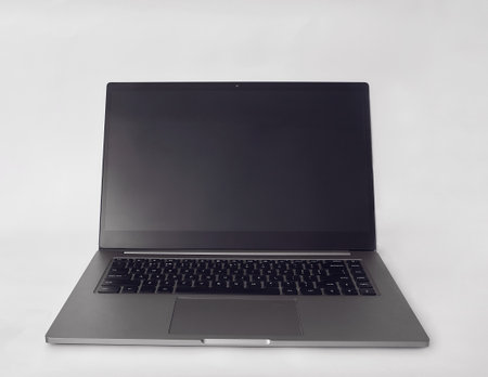 Gray laptop notebook with blank screen on white backgroundの写真素材