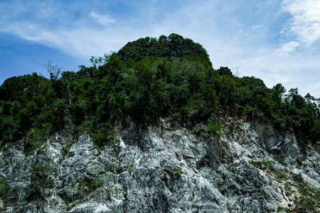 Rock Mountain green hill range a clouds panoramic landscapeの写真素材