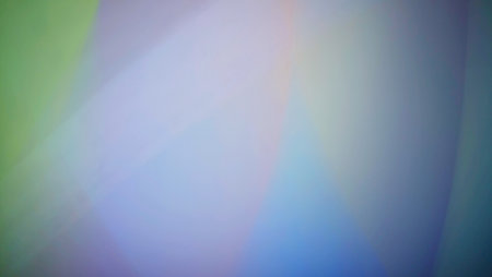 Smooth and blurry colorful gradient mesh background. Purple, yellow, green and black.