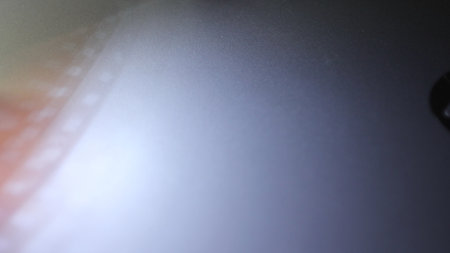 Shading light from photographic film intensity on a silver background
