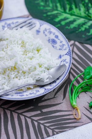 Steamed rice in an ancient plate and Stewed Eggs, Thai food and street food that are common in Thailand.の写真素材