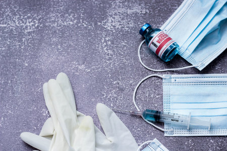 Medical waste from vaccinations, medical gloves, syringes, masks.