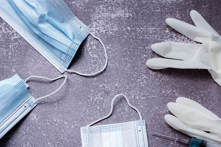 Medical waste from vaccinations, medical gloves, syringes, masks.