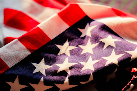 The sun shone on the american flag Images for America National Day or important days related to America.の写真素材