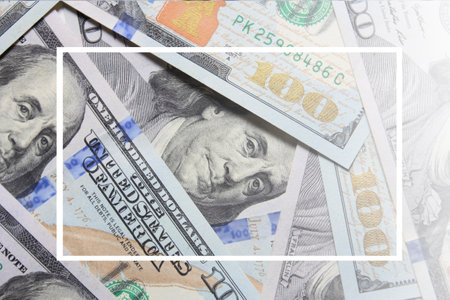 100 dollar US banknotes placed on a white background.backdrop,wallpaper,white line.の写真素材