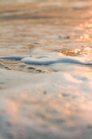 The sun is rising, the sun is bright, the morning sea at Cha-Am Beach, Thailand.