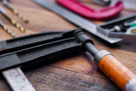Collection of woodworking tools on a wooden background in USA.の写真素材