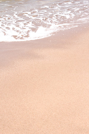 beach and tropical sea - soft wave of ocean on sandy beachの写真素材