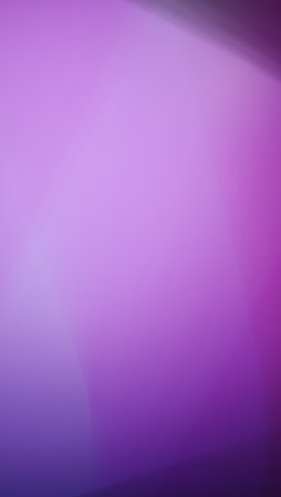 A gradient of pink and purple hues blends seamlessly, creating a smooth and dreamy transition. The abstract nature and soft tones make it ideal for artistic and atmospheric compositions.の写真素材