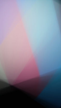 A smooth gradient seamlessly transitions between rich hues of purple, blue, yellow, and red. The...