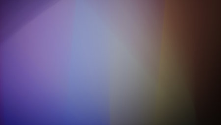 A vibrant gradient blends rich hues of purple, blue, yellow, and red in a seamless transition. The...
