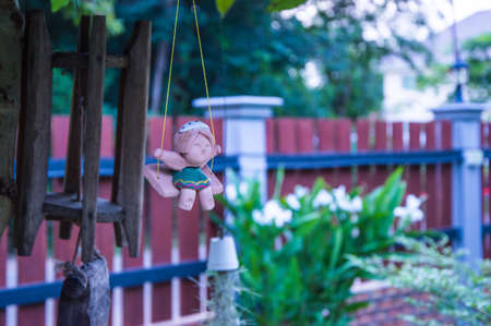 doll in the garden outside homeの写真素材
