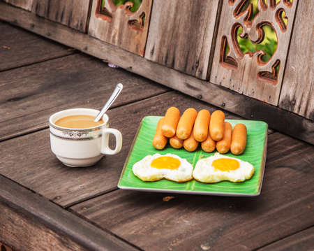 coffee cup on wood tableの写真素材