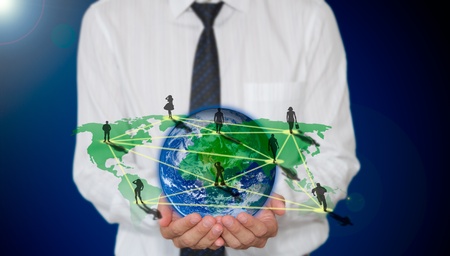Businessman holding Planet earth with social network connection