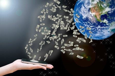 Hand sent money via smart phoneの写真素材