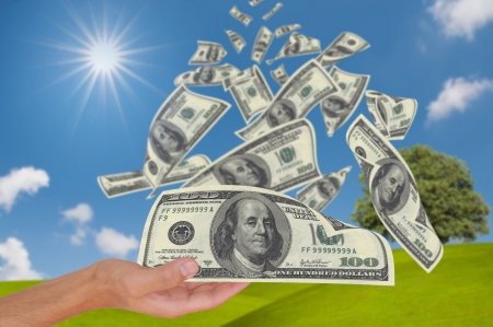 Hand get money falling from sky Hand get money falling from sky