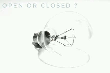 Bulb on white background / open or closed / save my world.の素材